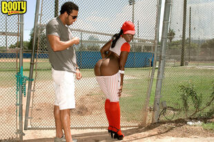 Black doll Kali Desires sets her meaty culo free of baseball