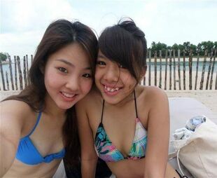 Small Asian gfs on the beach